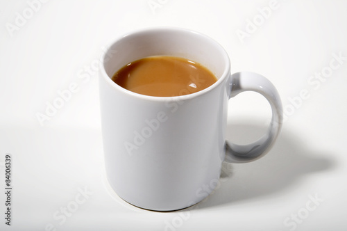Quadro su tela Plain white mug of strong tea