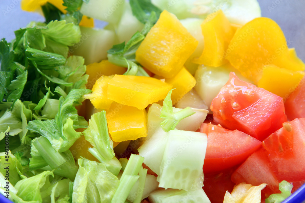 vegetable salad background: cucumber, tomato and celery
vegetable salad background: cucumber, tomato and celery