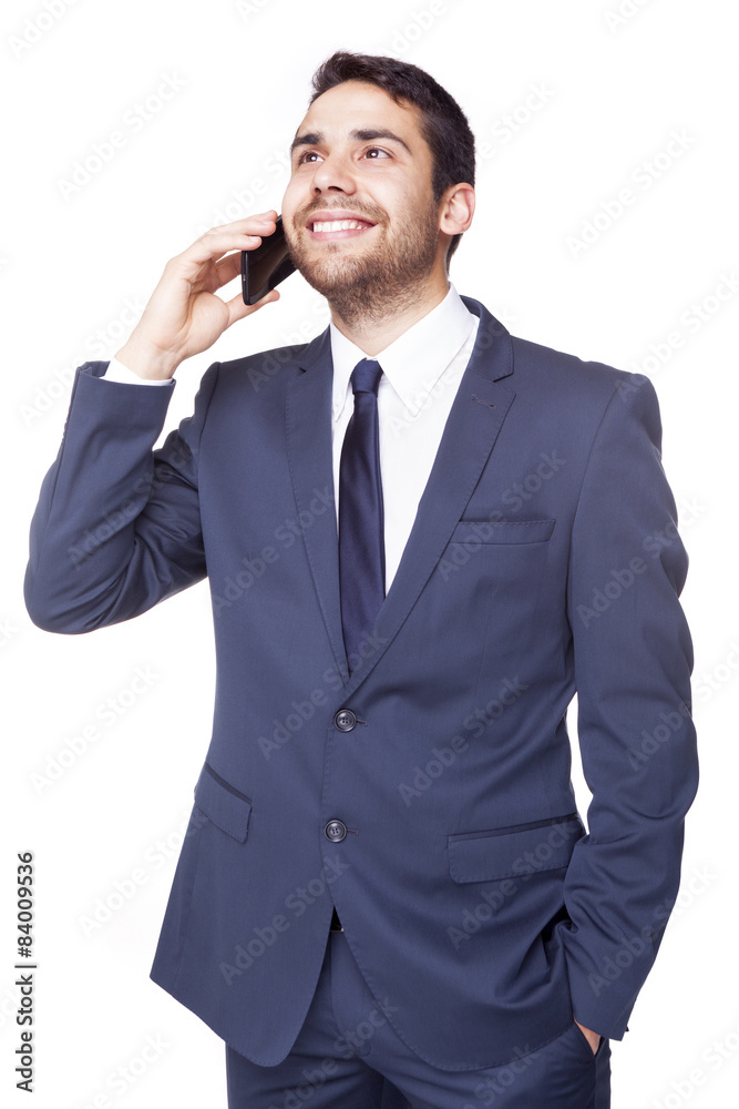 Happy businessman talking on the cell phone, isolated on white b Happy businessman talking on the cell phone, isolated on white b