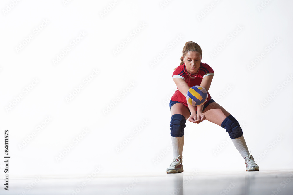 volleyball woman jump and kick ball isolated on white background