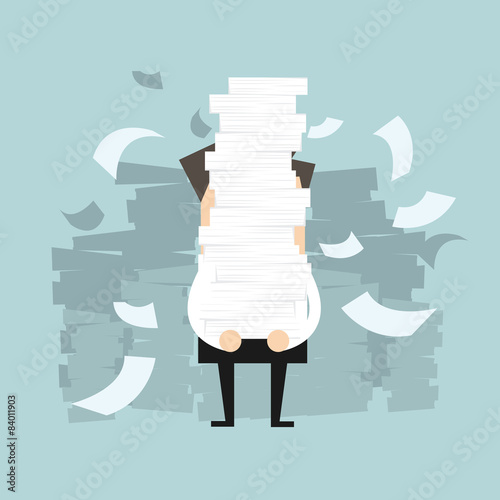 Businessman holding a lot of documents in his hands