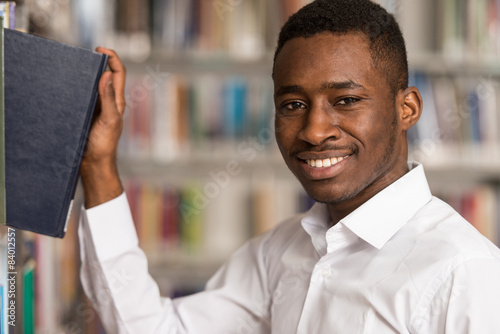 Portrait Of A Student In A Library