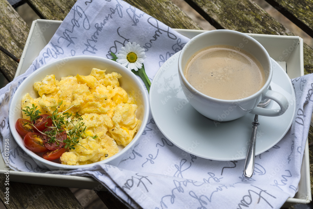 Aerial view fresh scrambled eggs on plate wooden background Aerial view fresh scrambled eggs on plate wooden background
