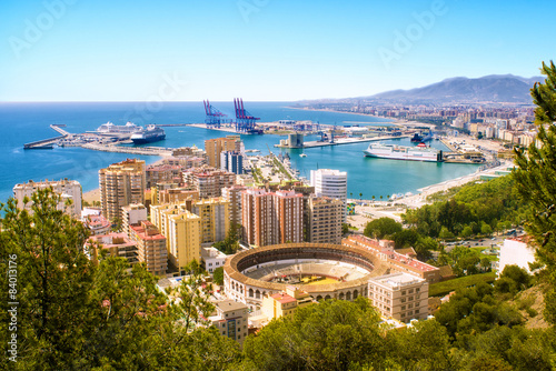 View of Malaga with bullring and harbor. Spain