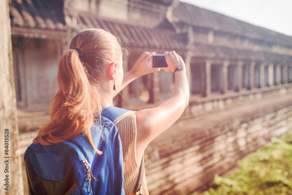 Tourist taking picture in the temple Angkor Wat, Cambodia