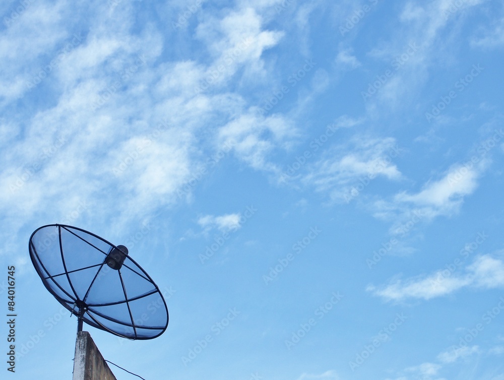 Satellite dish on the blue sky.