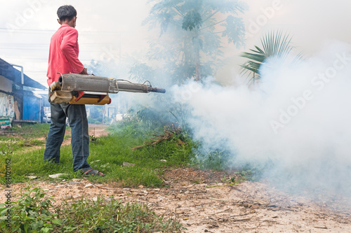 Man Fogging to prevent spread of dengue fever in Thailand