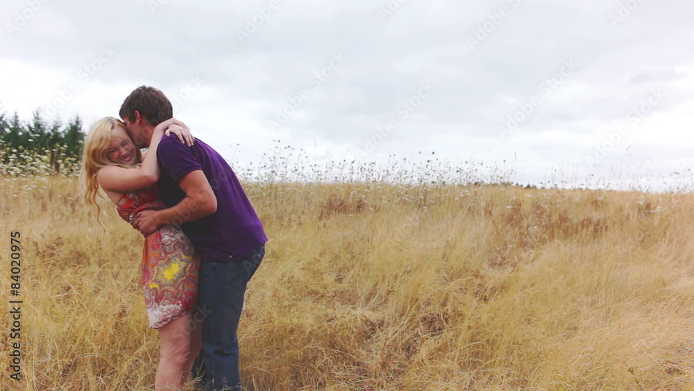 Boyfriend and girlfriend embrace with a hug. Boyfriend and girlfriend embrace with a hug.