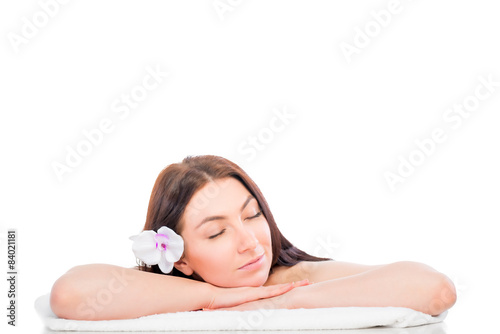 Asleep girl on spa treatments isolated