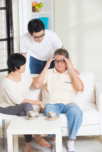 asian man with sick father and mother