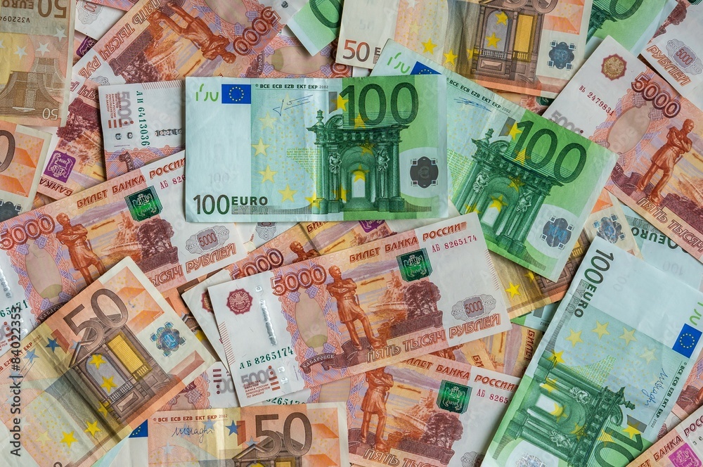 Russian and Euro banknotes background Russian and Euro banknotes background