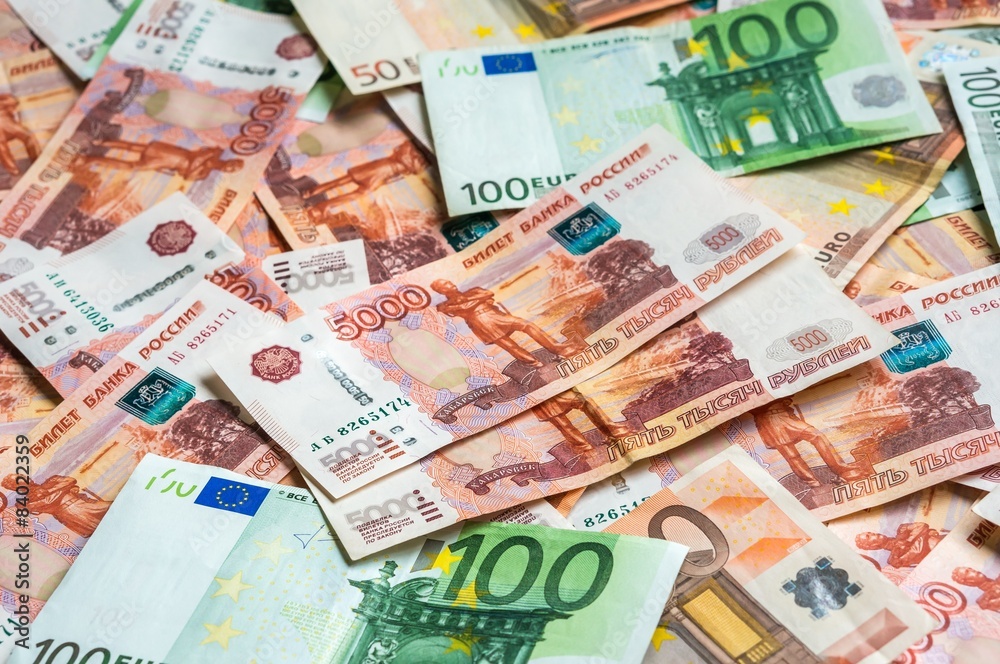 Russian and Euro banknotes background Russian and Euro banknotes background