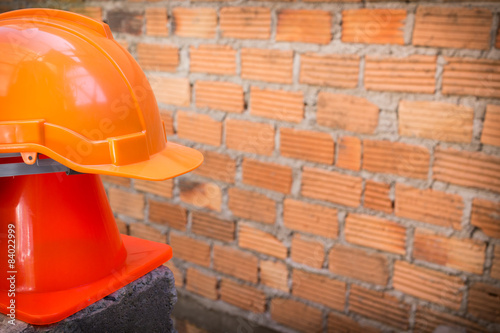 construction helmet safety and cone in construction site