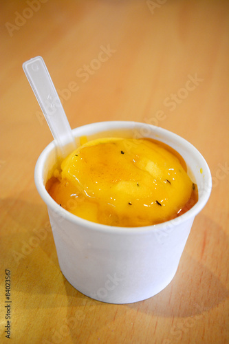 passion fruit ice cream in white cup
