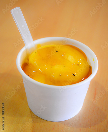 passion fruit ice cream in white cup