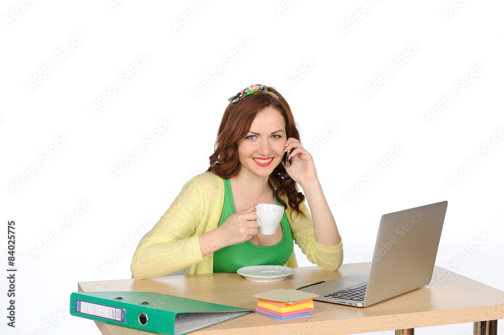 Happy young successful woman working at desk with laptop Happy young successful woman working at desk with laptop