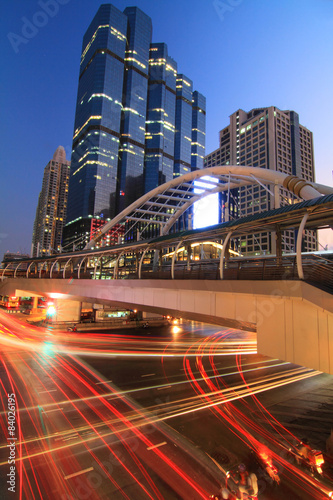 Beautiful bridge and Blur light of car traffic in the city. © rukawajung