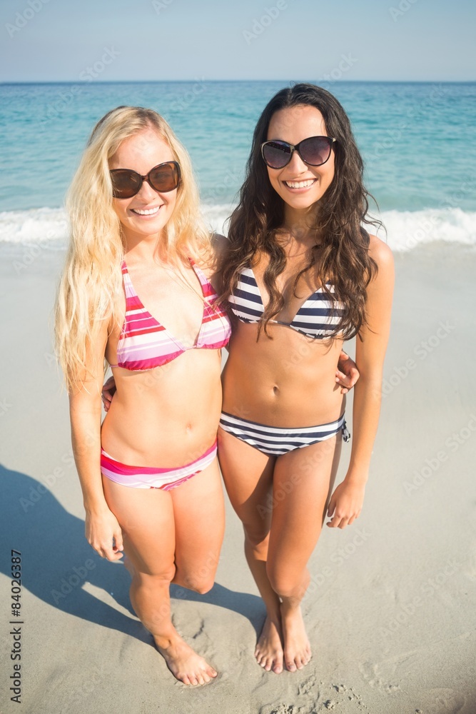 two friends in swimsuits