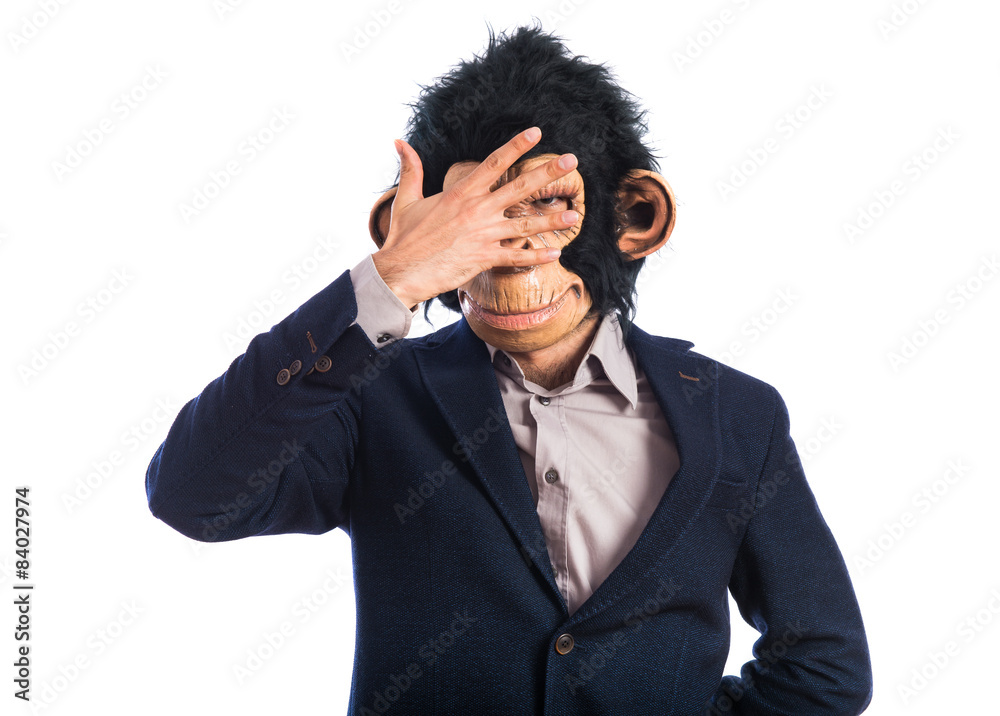 Monkey man covering his face Monkey man covering his face