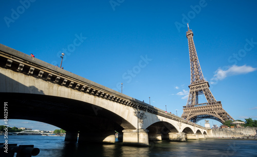The Eiffel Tower and bridge over Seine River in Paris © F.C.G.