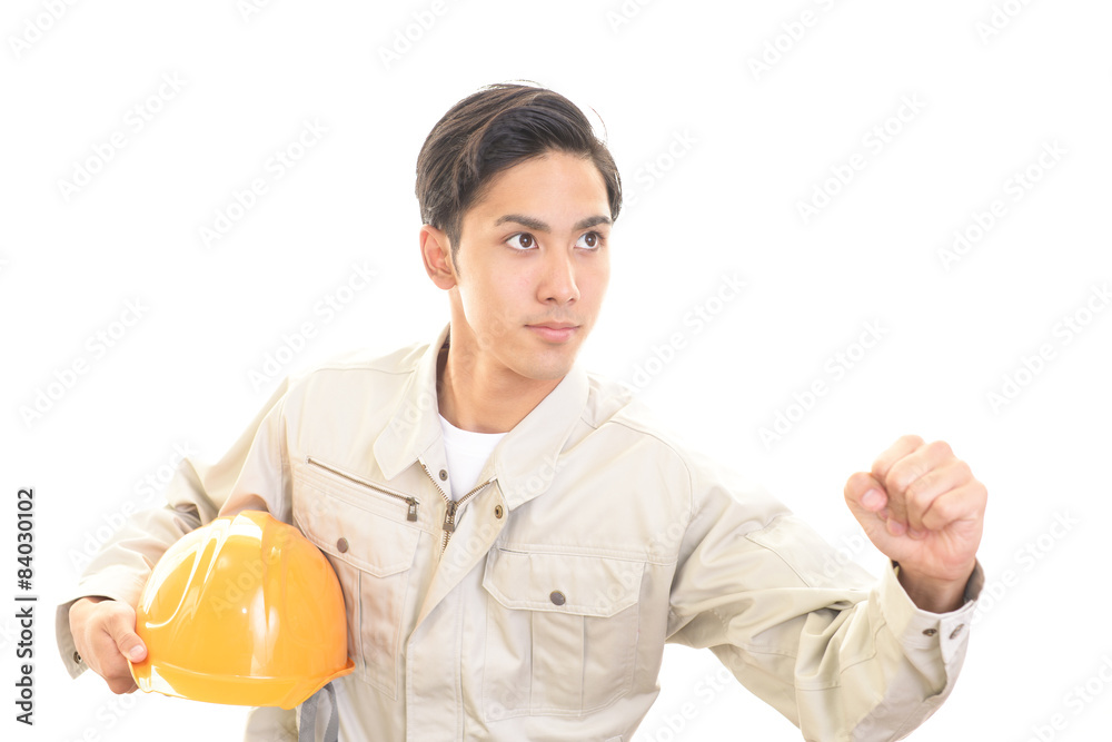 ガッツポーズの作業員