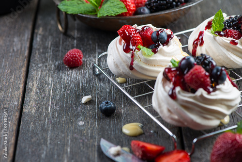 Homemade pavlova meringue with fresh berries photo