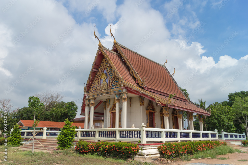 Temple with tree and sky background at Wat Sahakon Rangsan