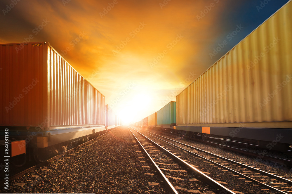 Fototapeta premium industry container trainst running on railways track against bea