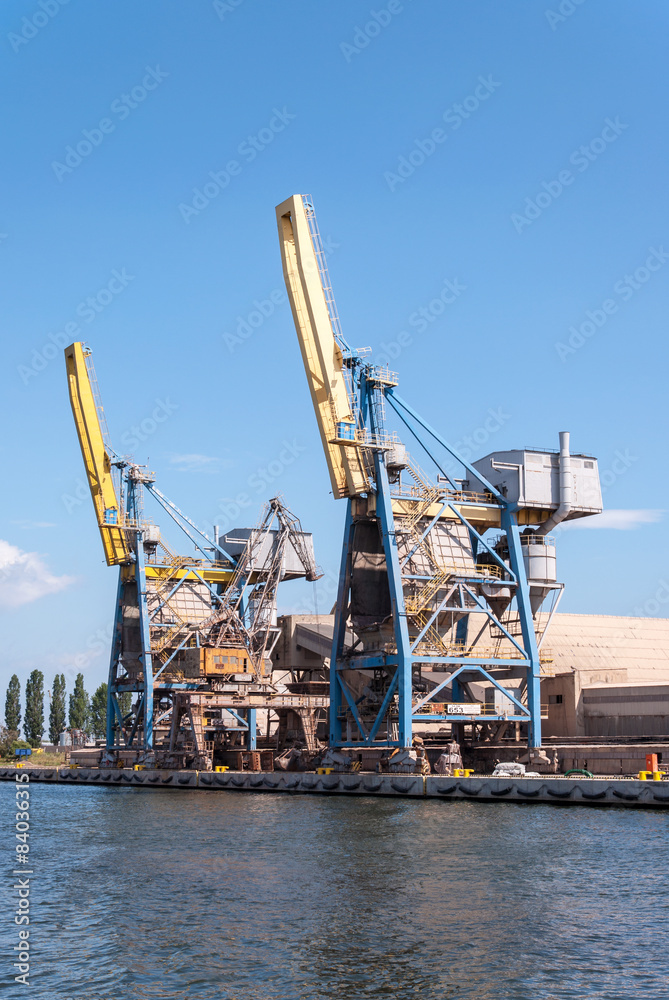 Two container cranes in Gdansk harbor