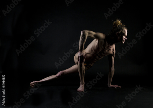 Young man practicing yoga