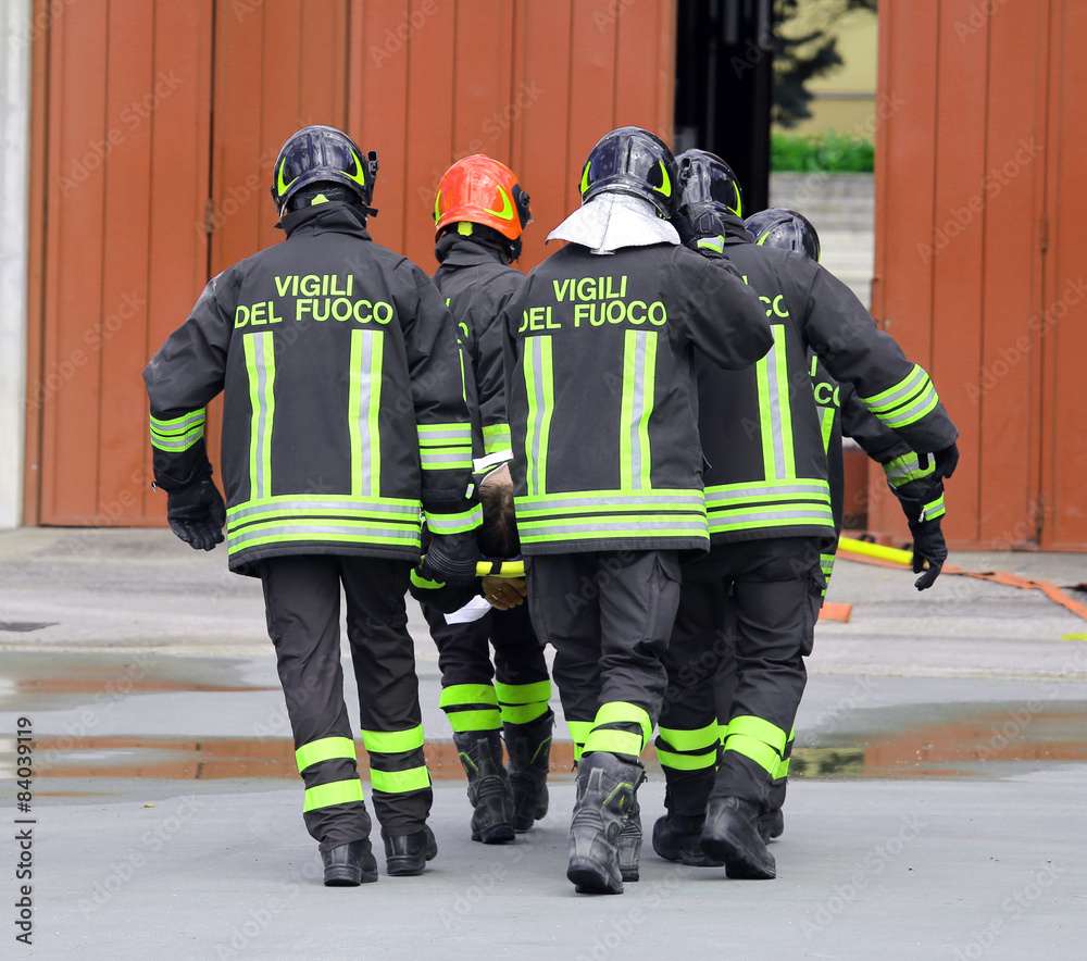 wounded carried by firefighters on a stretcher wounded carried by firefighters on a stretcher