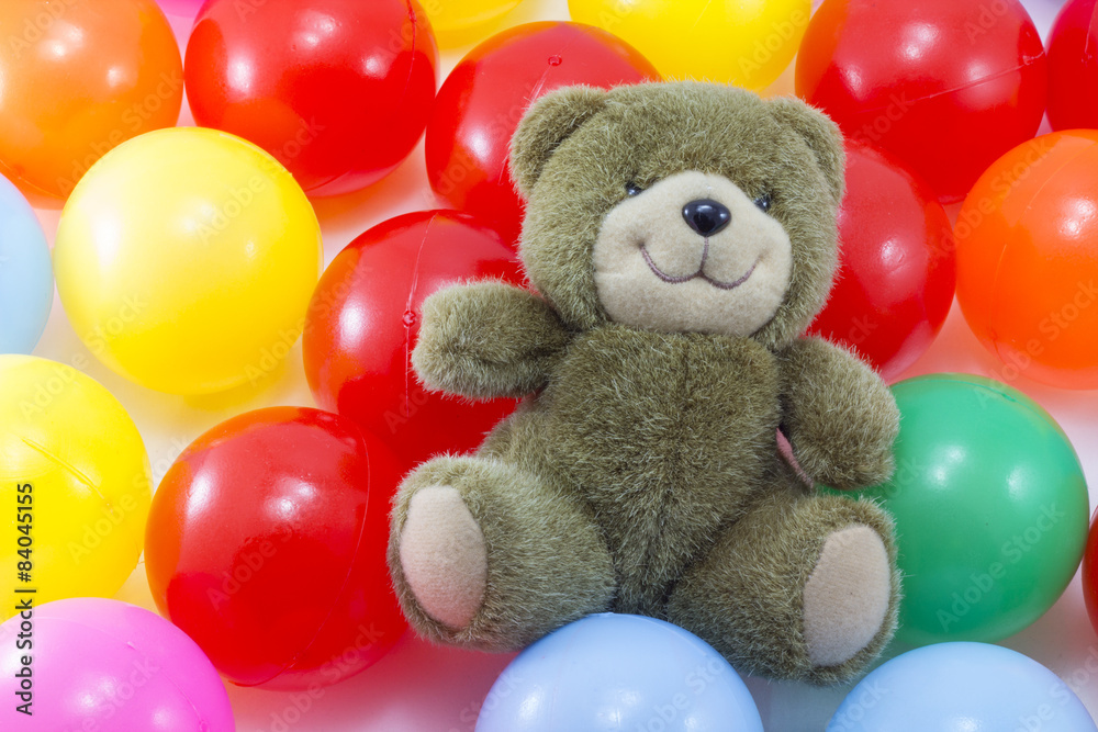 Colorful plastic ball and bear toy