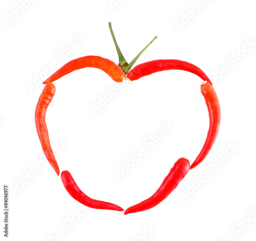 Red chili pepper heart shape isolated on white background.