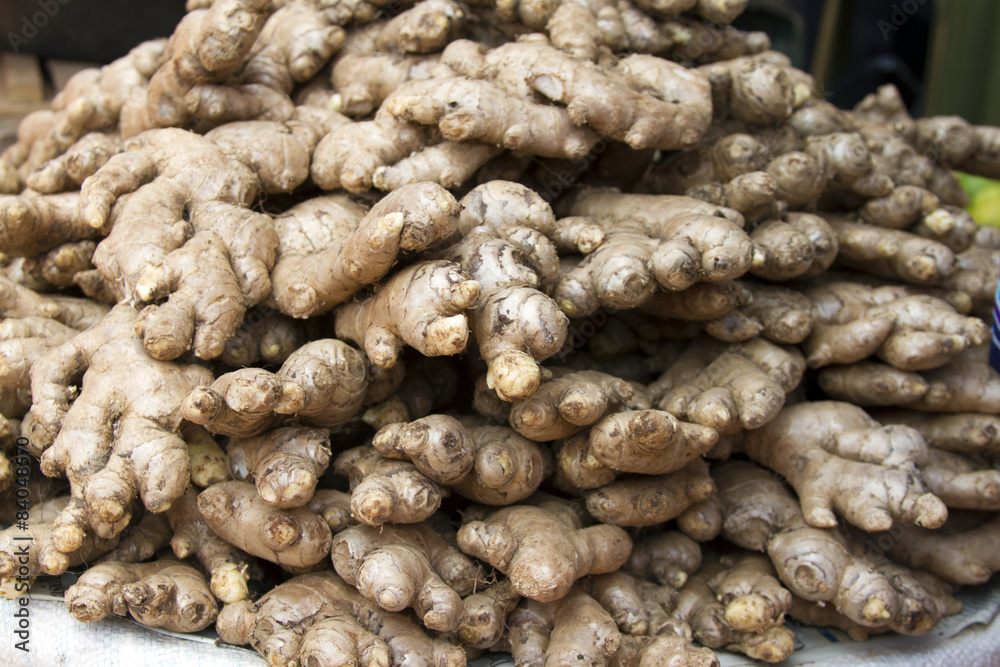 Fresh juicy ginger on a counter in the market of India of Goa Fresh juicy ginger on a counter in the market of India of Goa