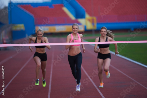 Female Runners Finishing Race Together