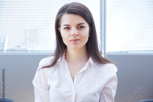 Free Download Business woman sitting in the office - GFXLoad