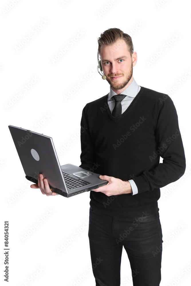 Attractive businessman with headset and laptop working Attractive businessman with headset and laptop working