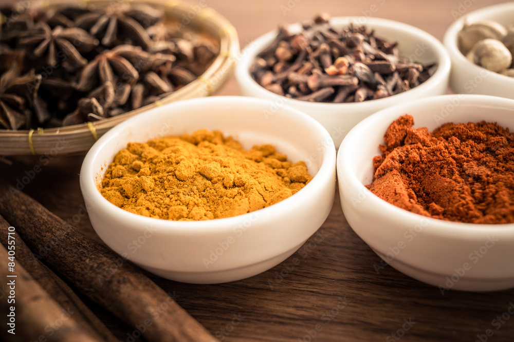 Wooden table of colorful spices