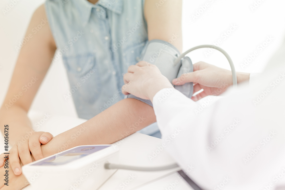 Young and professional doctor working in office Young and professional doctor working in office