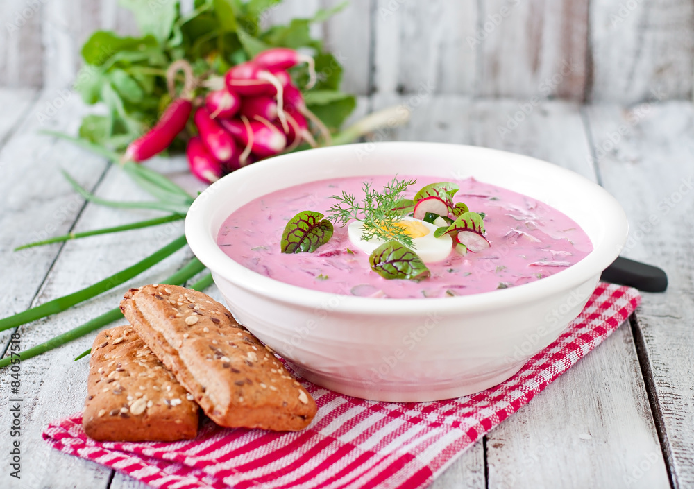 Cold beet soup on yogurt with egg, radishes and cucumbers Cold beet soup on yogurt with egg, radishes and cucumbers
