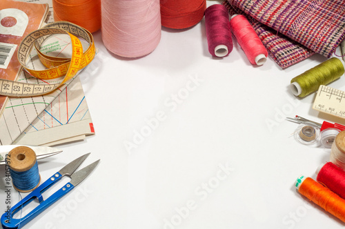 various sewing supplies on a white background 