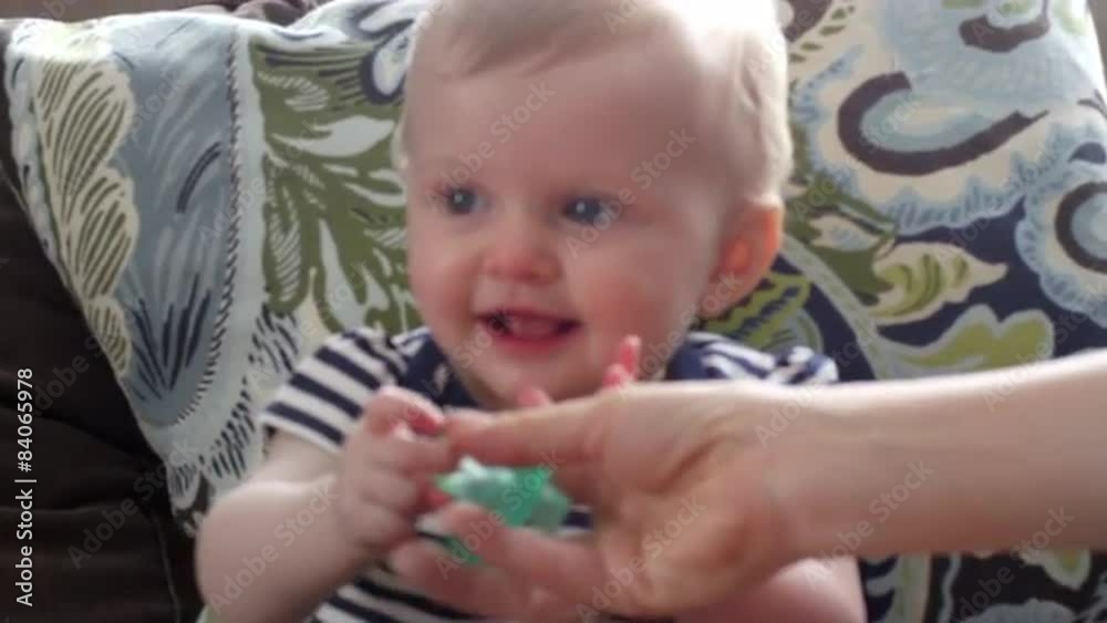 Baby sitting on a couch Baby sitting on a couch