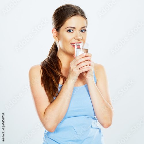 woman drinking water with glass .