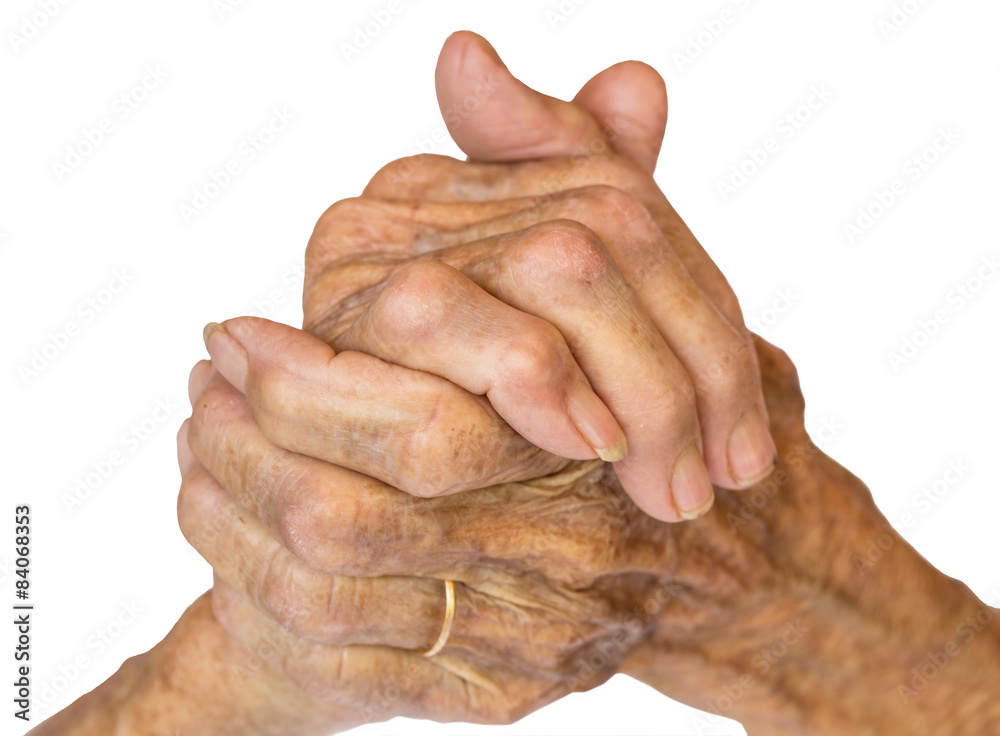 Fototapeta premium Hands of the old woman on isolated and white background.