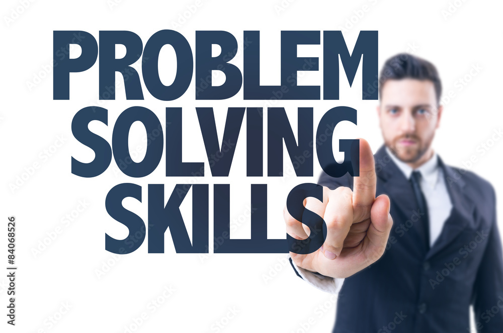 Business man pointing the text: Problem Solving Skills Business man pointing the text: Problem Solving Skills