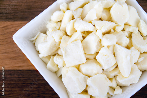 Konstfotografi white dairy cheese curd in a bowl on table