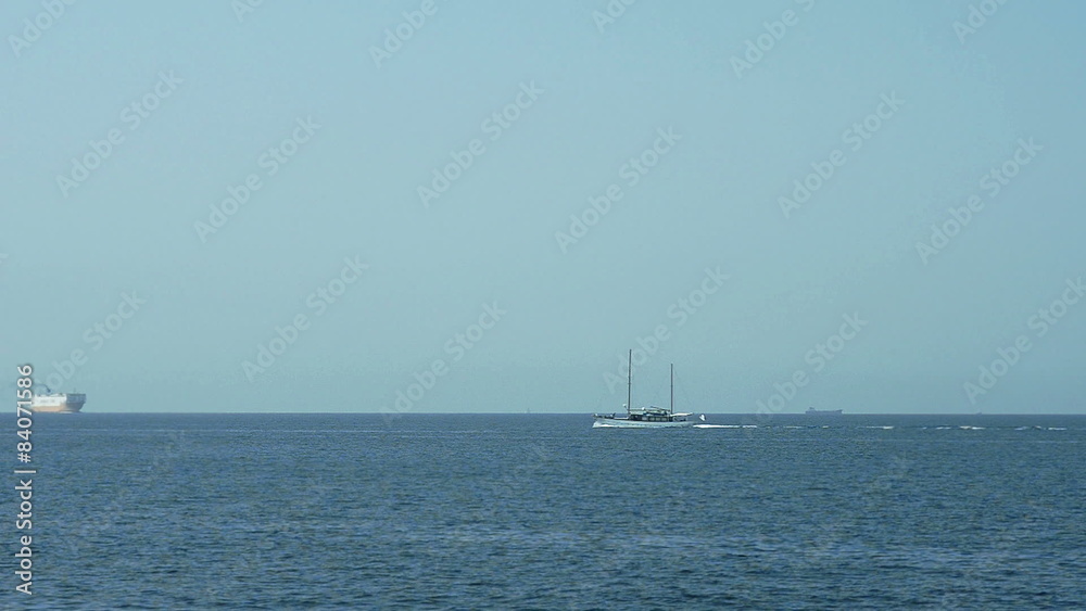 Yacht classic-style floats on the sea Yacht classic-style floats on the sea