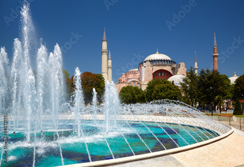 The fontain in Sultan Ahmet Park with Hagia Sophia in the backg