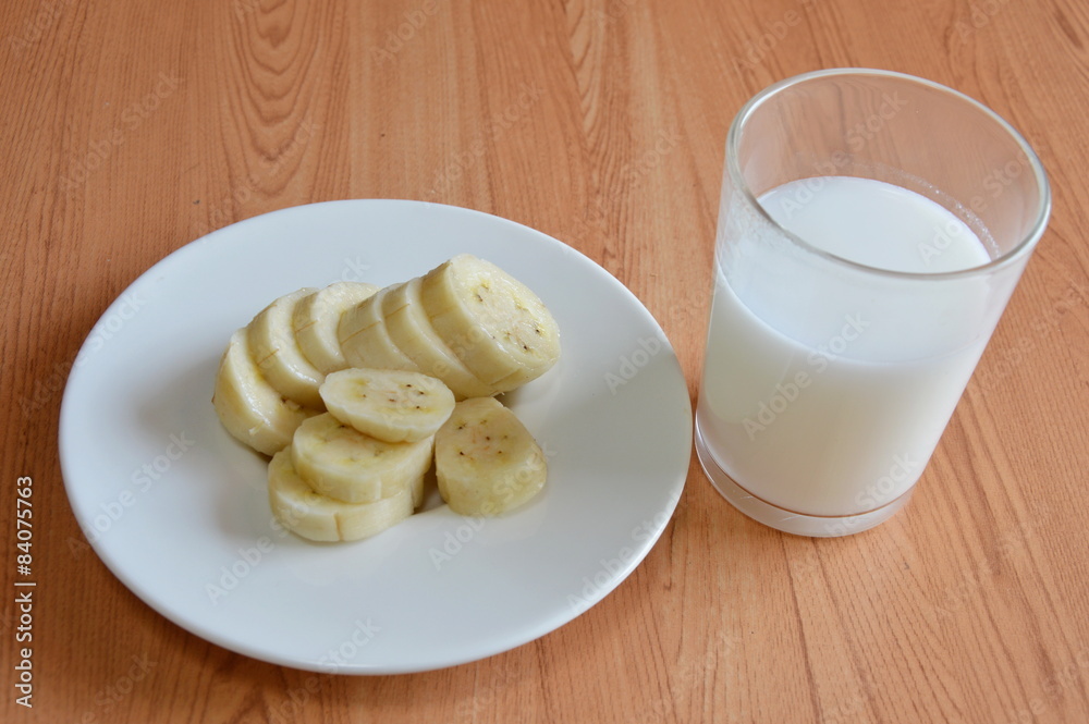 cultivated banana slice and milk glass cultivated banana slice and milk glass