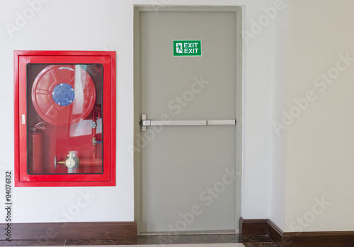 Fotografi Fire exit door and fire extinguish equipment